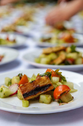 Kasey Mills of Toro Bravo plates at Chef in My Garden | © Matt Giraud Photography