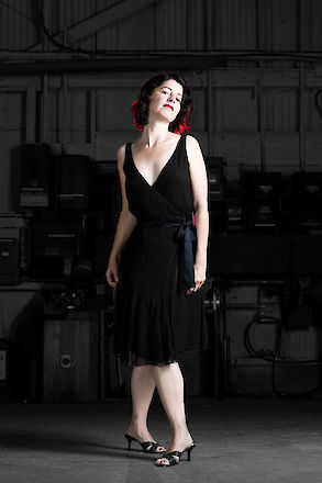 In the warehouse, a femme fatale emerges from the darkness | © Matt Giraud Photography