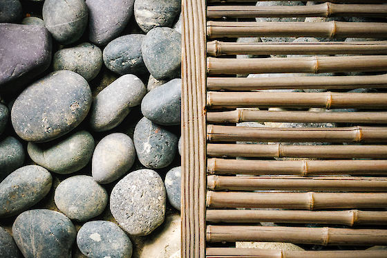 Stone in balance with bamboo at the historic Kikuya House in Hagi, Japan. | © Matt Giraud Photography